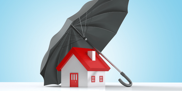 Insurance Process for Roof Damage- insurance concept- home is protected by umbrella